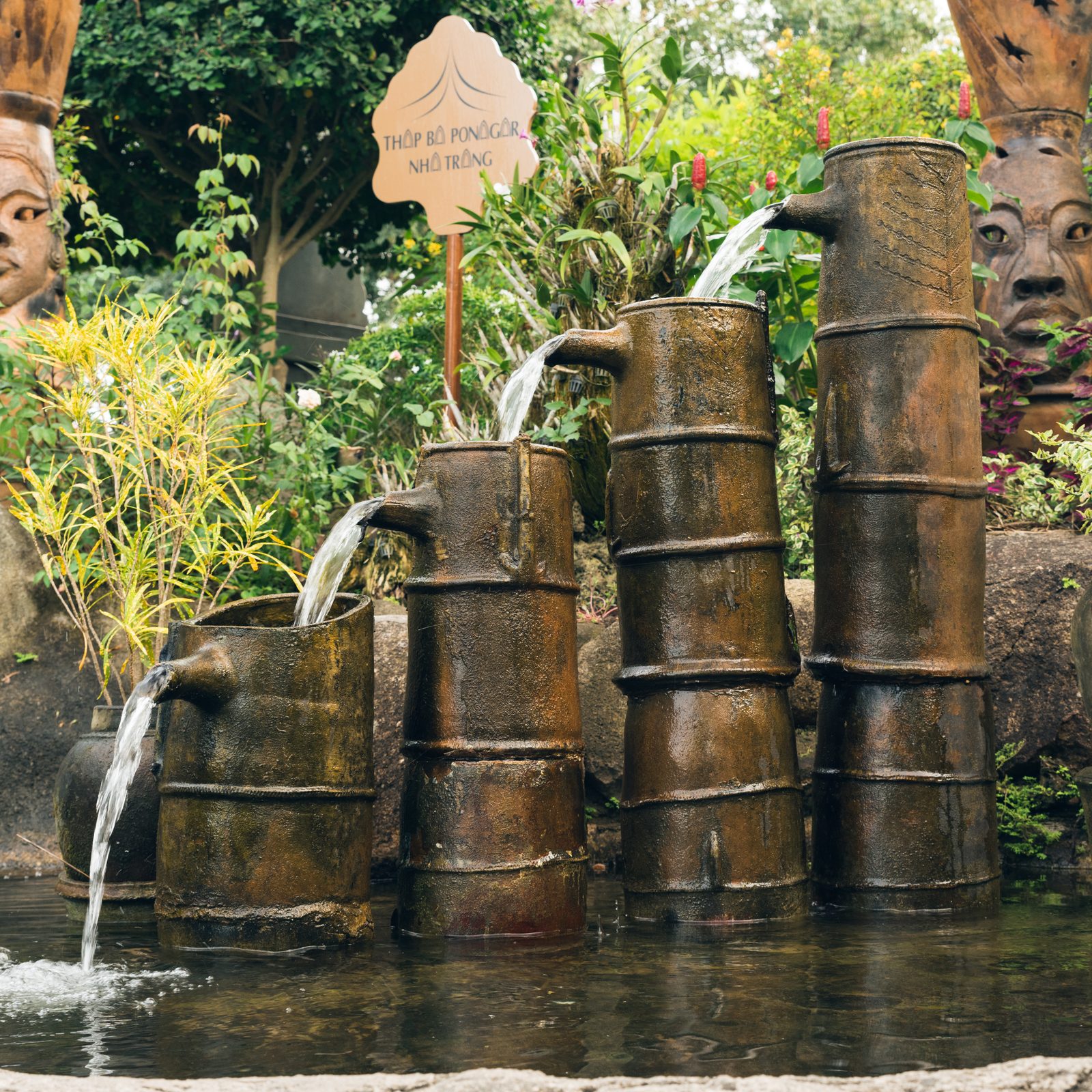 Bamboo-style spout fountain in a Japanese garden setting