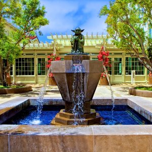 Corporate campus courtyard fountain with blue-tiled basin