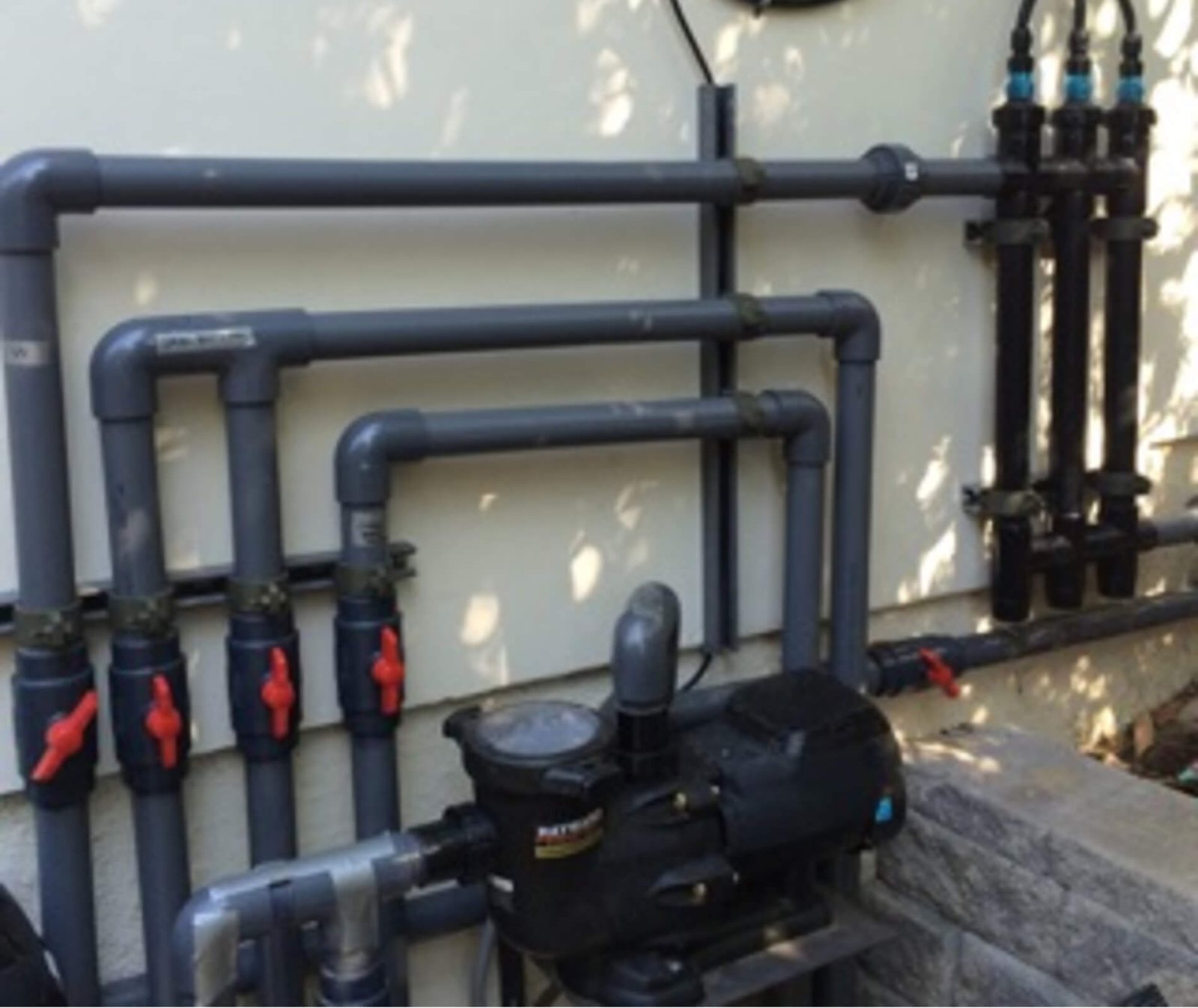 Hayward pump with valved PVC manifold and three UV clarifiers