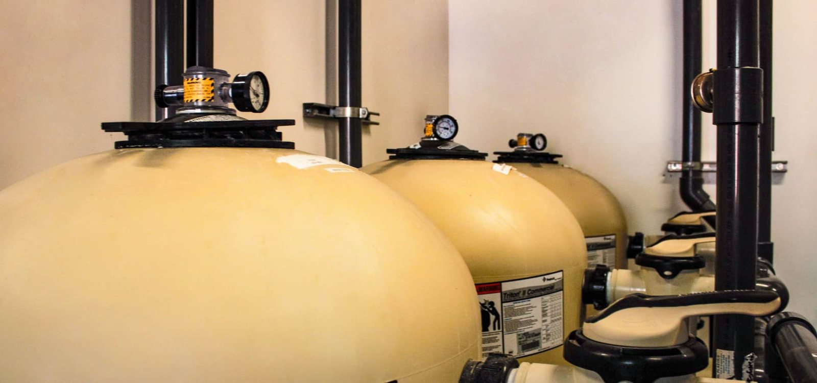 Bank of commercial sand filters with pressure gauges