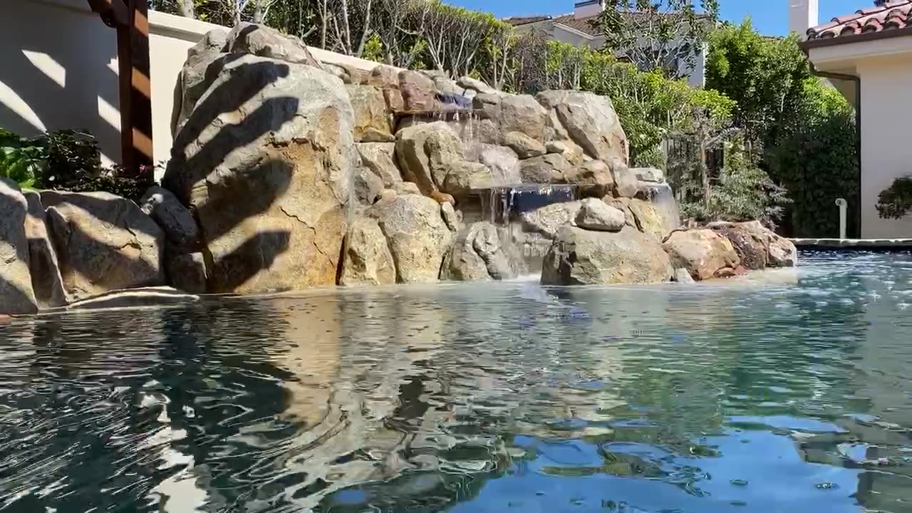Boulder waterfall on a Laguna Beach koi pond